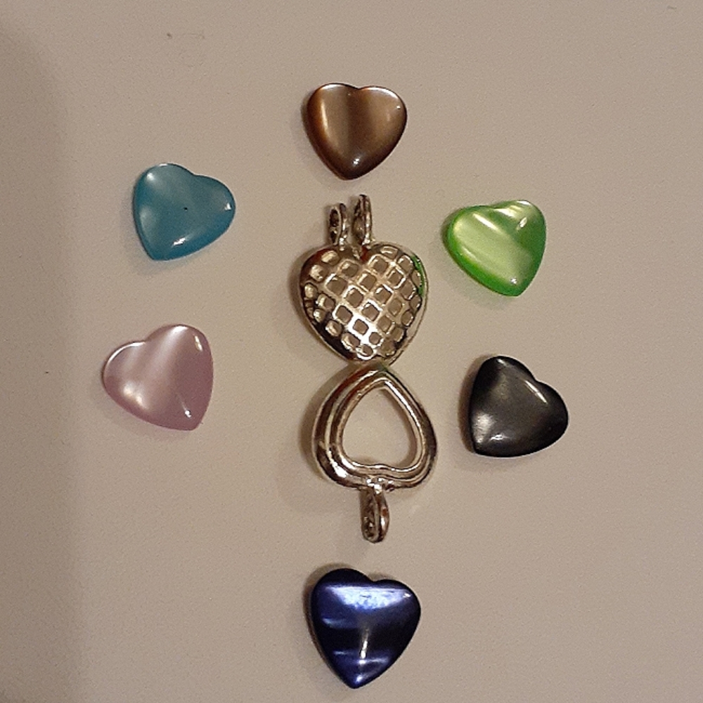 Heart cage pendant w 6 pearlized colors.  add to anklets bracelets necklace
